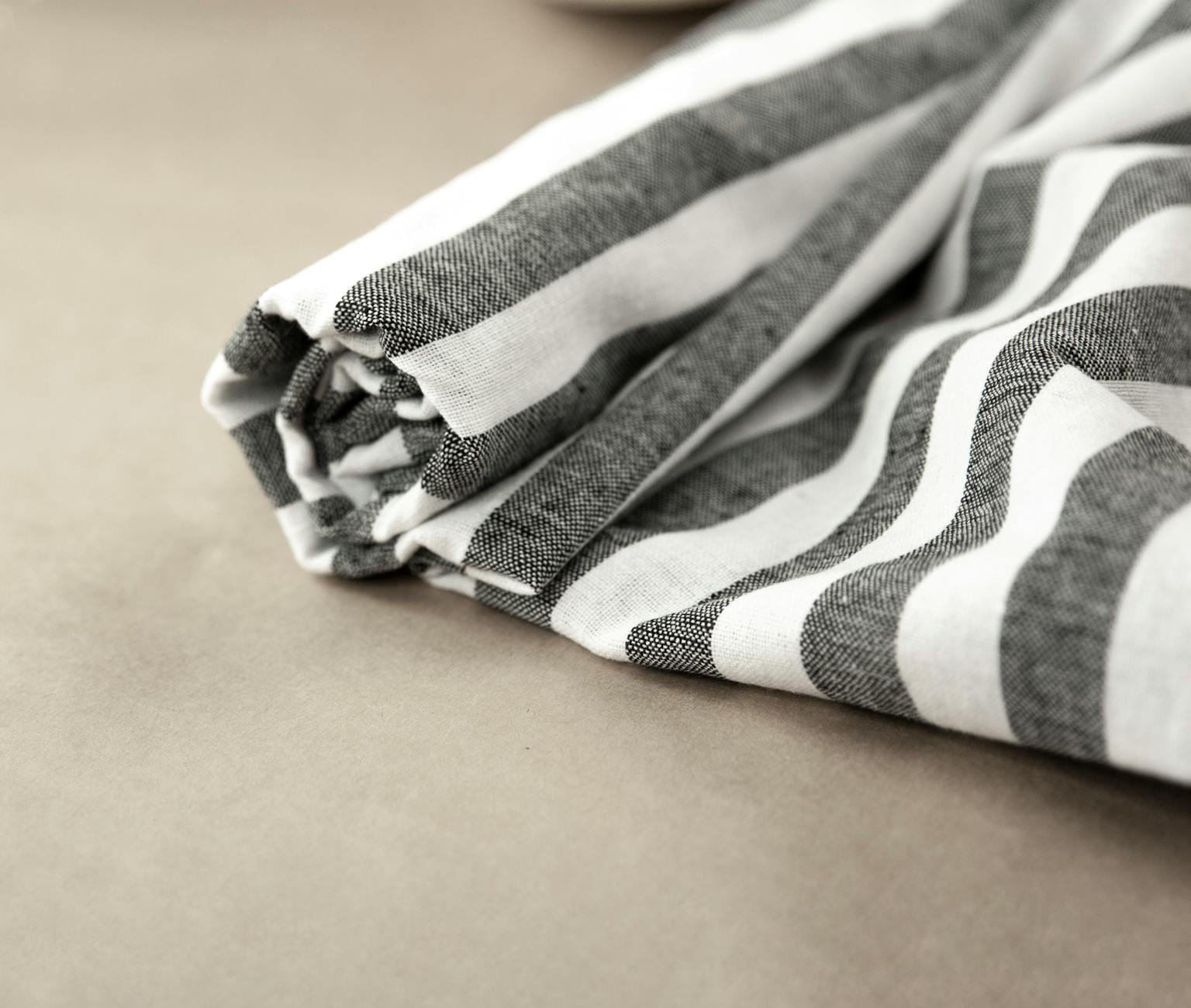 Parabet textile detail and natural linen styling in studio setting